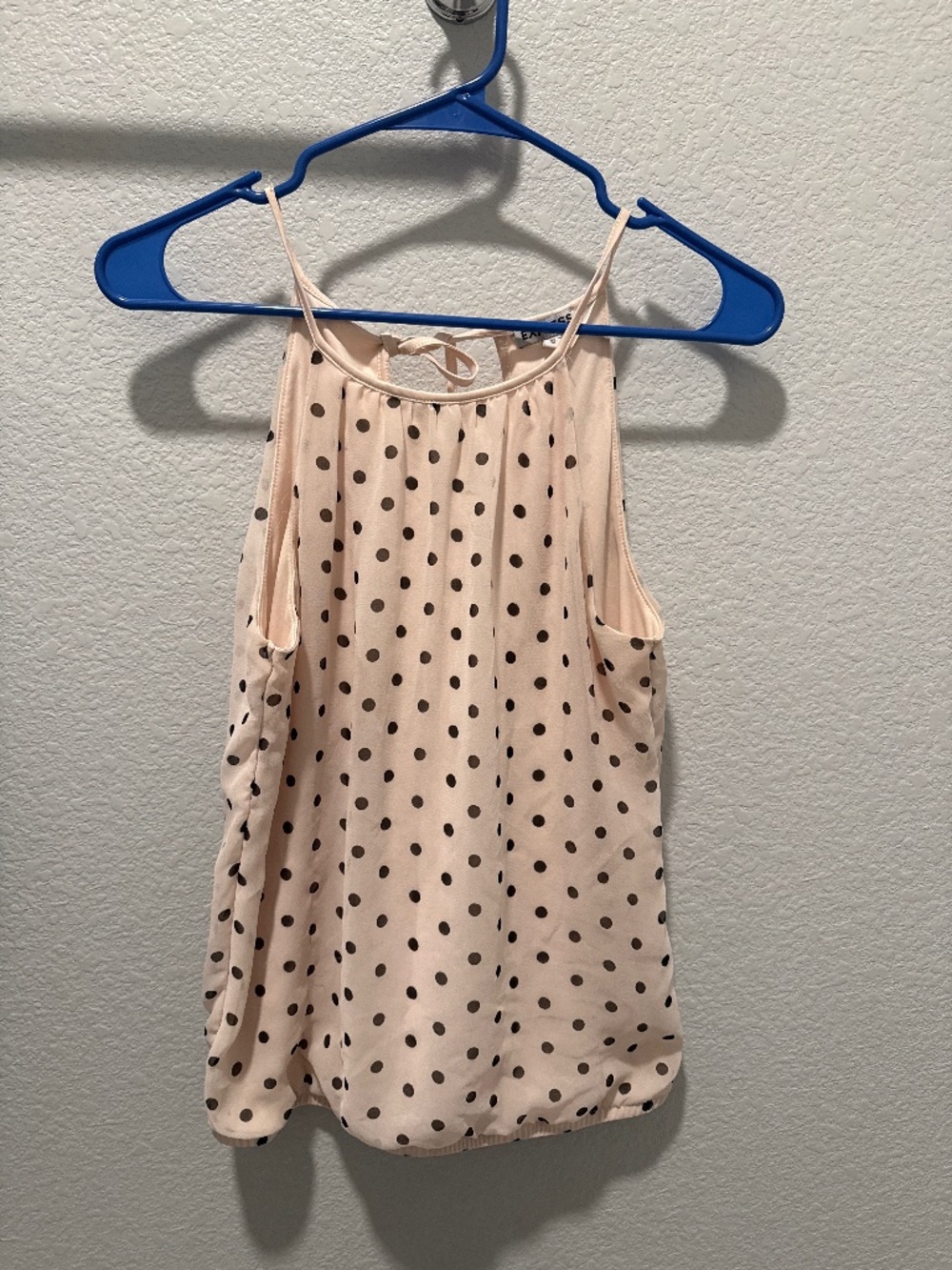 Polka-dot high-neck sleeveless blouse